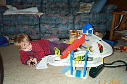 DCP_2356-Tyler playing with Craig's gift.JPG